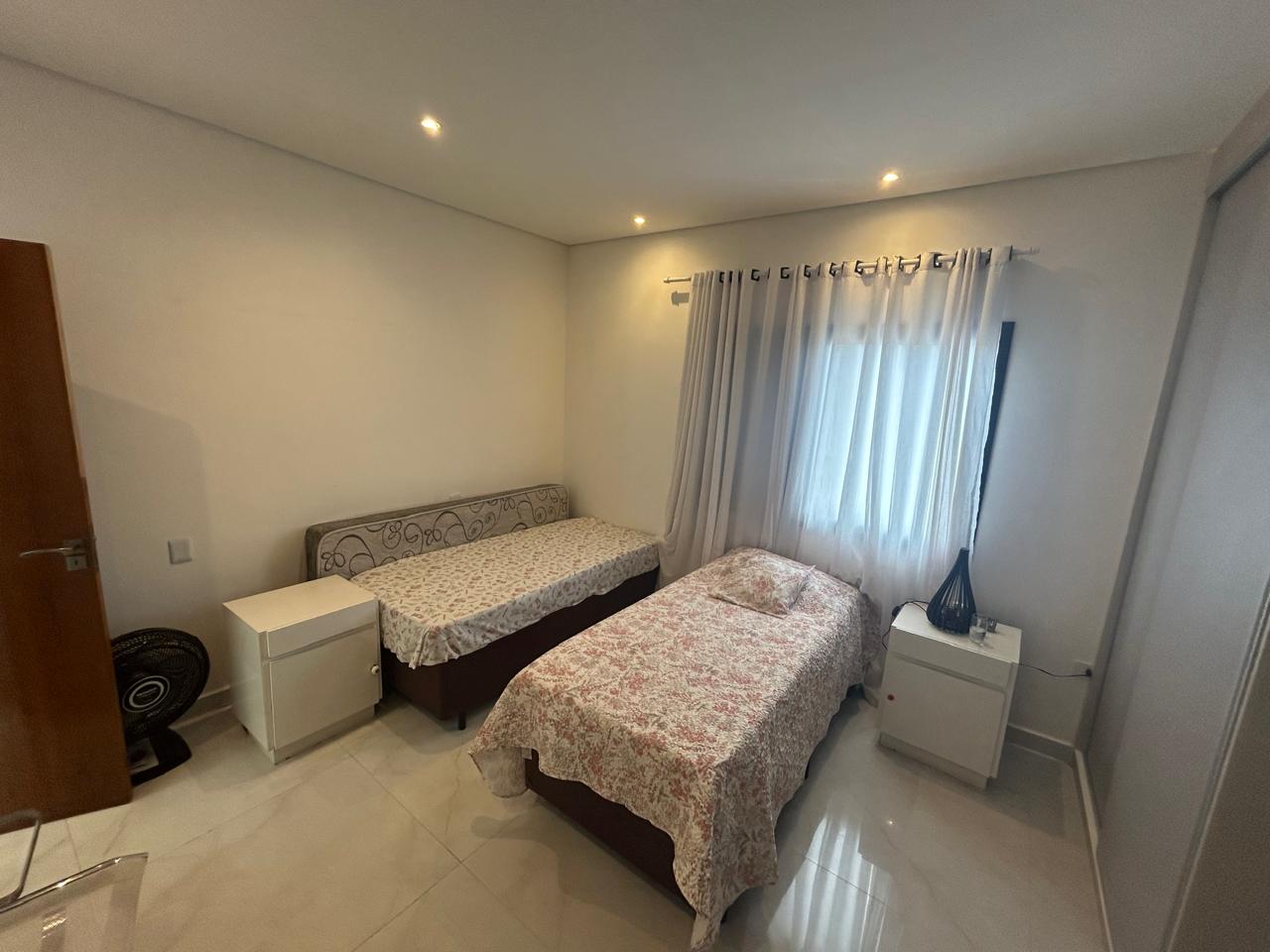 CAS261316 Sobrado no Condomínio Flora Rica Peruíbe com 4 suítes e piscina