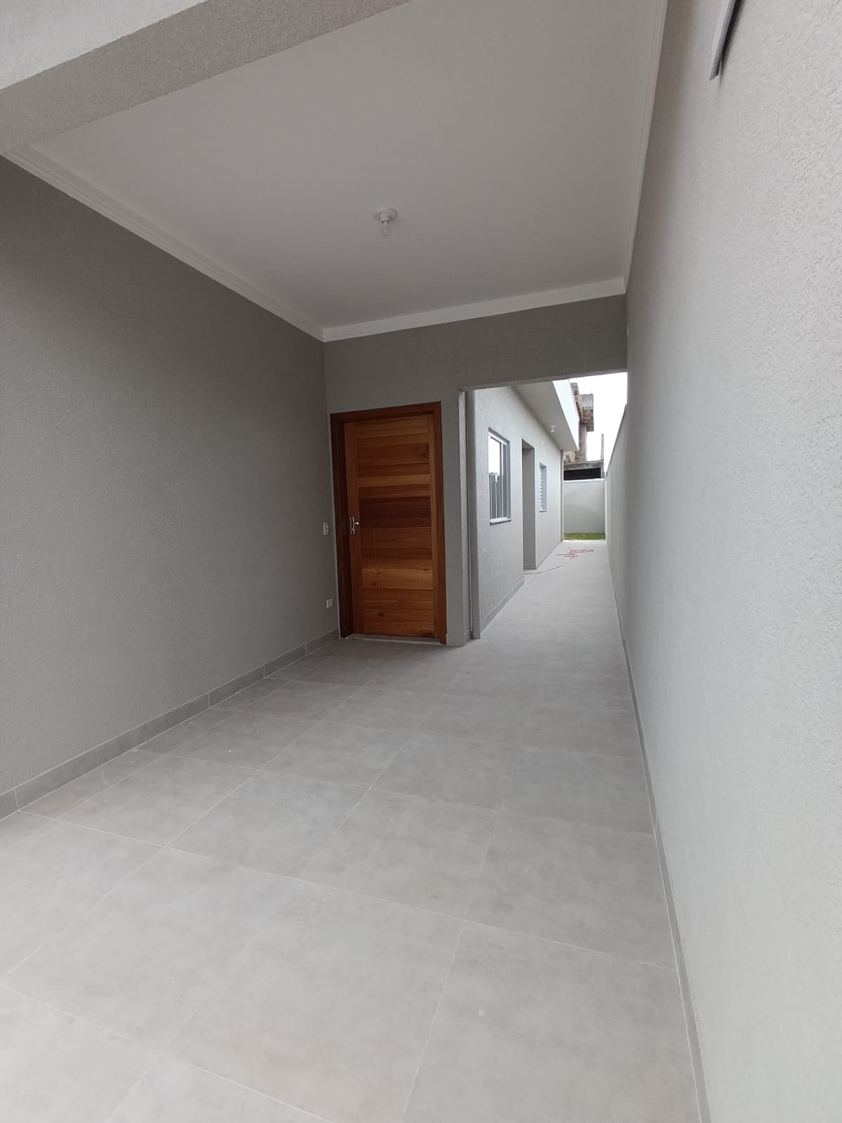 CAS261337 Casa assobradada em Itanhaém de esquina com 03 dormitórios e área gourmet
